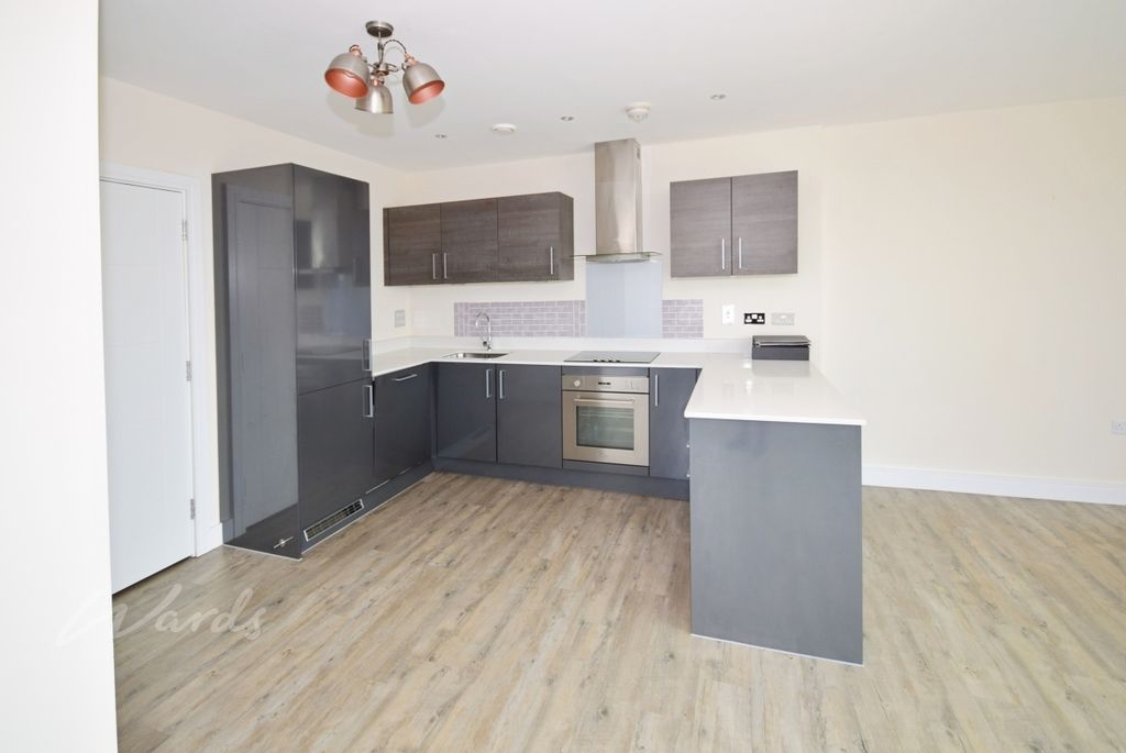 Property photo 3 of 13 Peninsula Kitchen