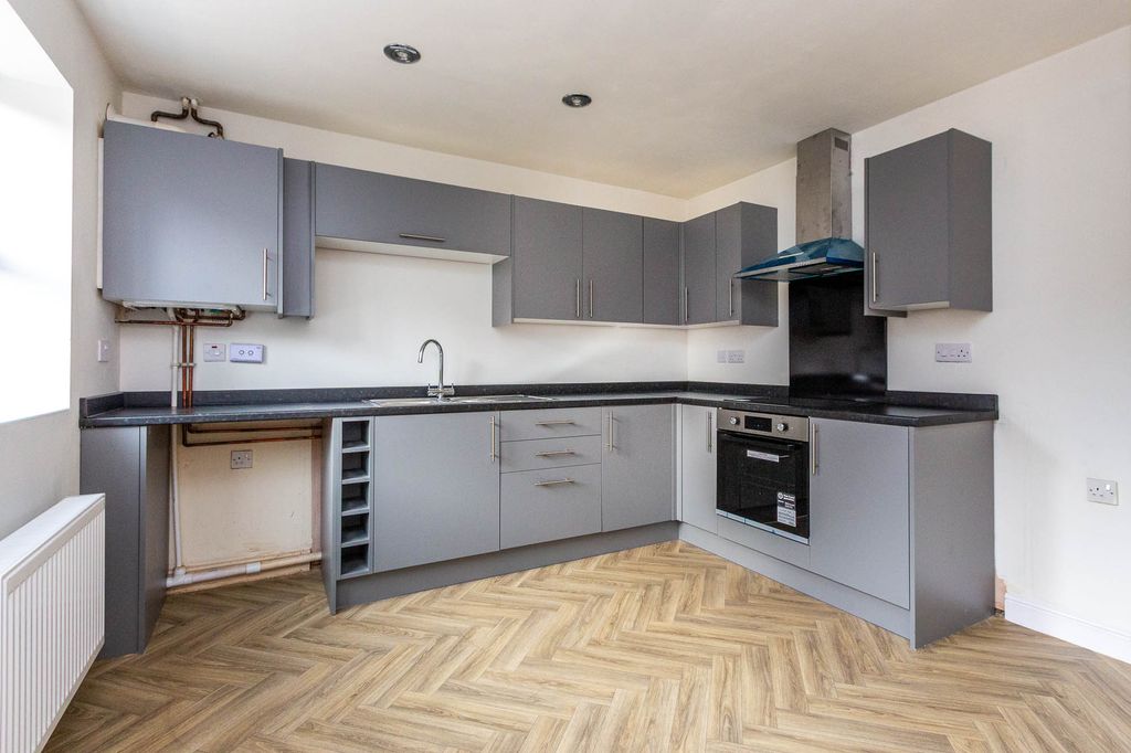 Property photo 2 of 12 Kitchen