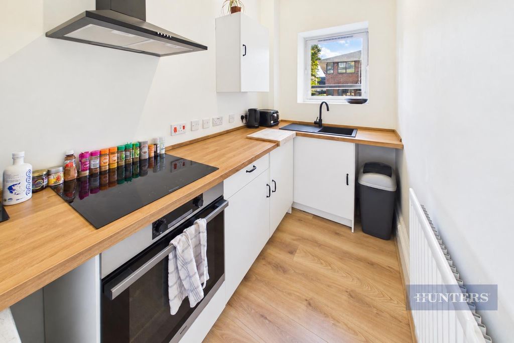 Property photo 2 of 12 Kitchen