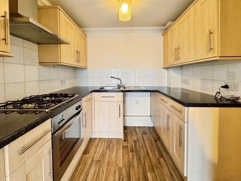 Property photo 3 of 9 Kitchen