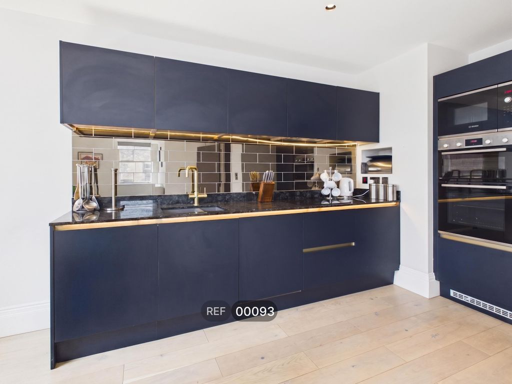 Property photo 1 of 20 Kitchen & Living Area