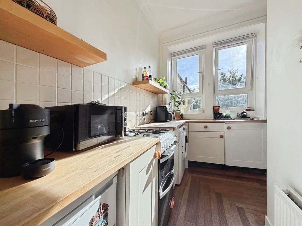 Property photo 3 of 12 Kitchen