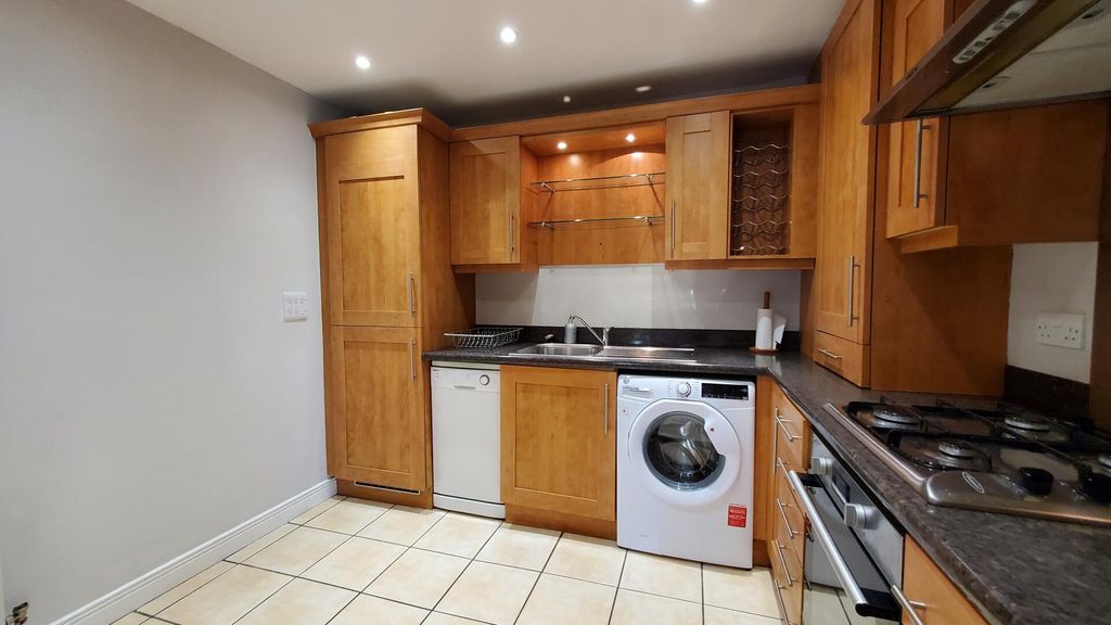 Property photo 3 of 12 Kitchen