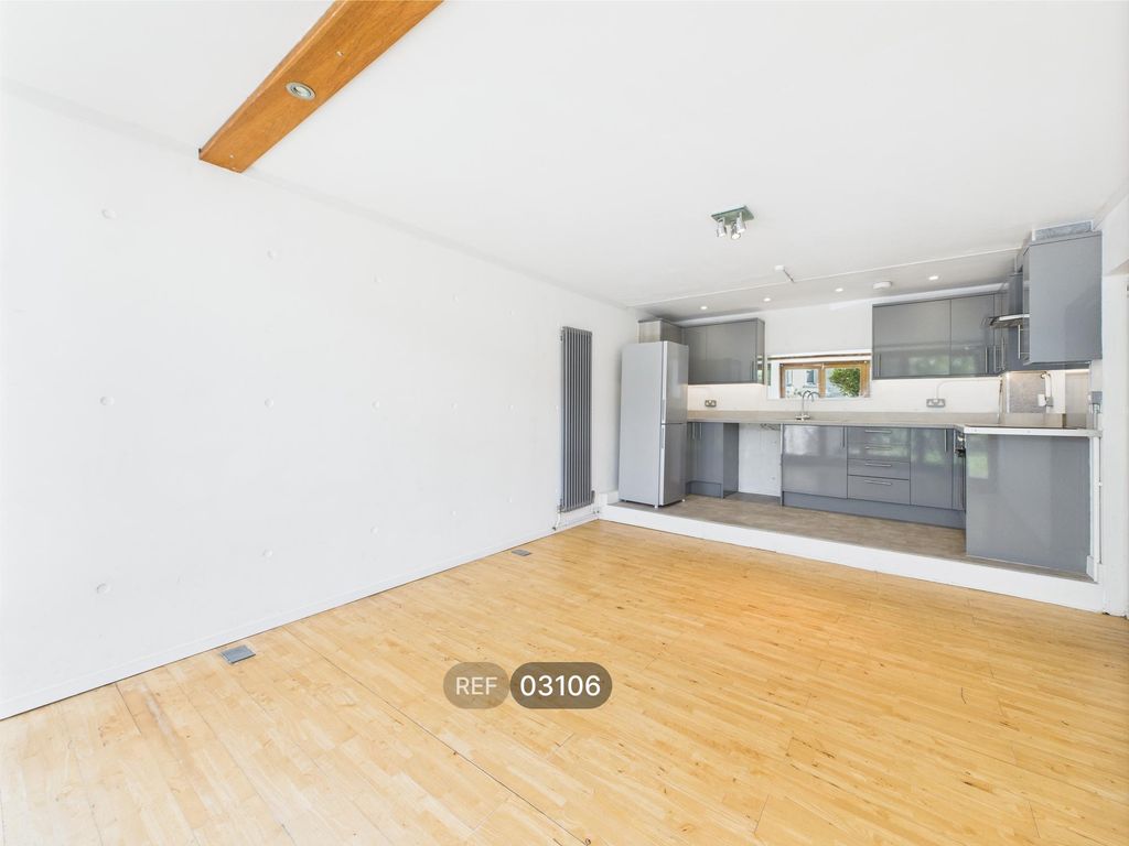 Property photo 2 of 10 Kitchen & Living Area