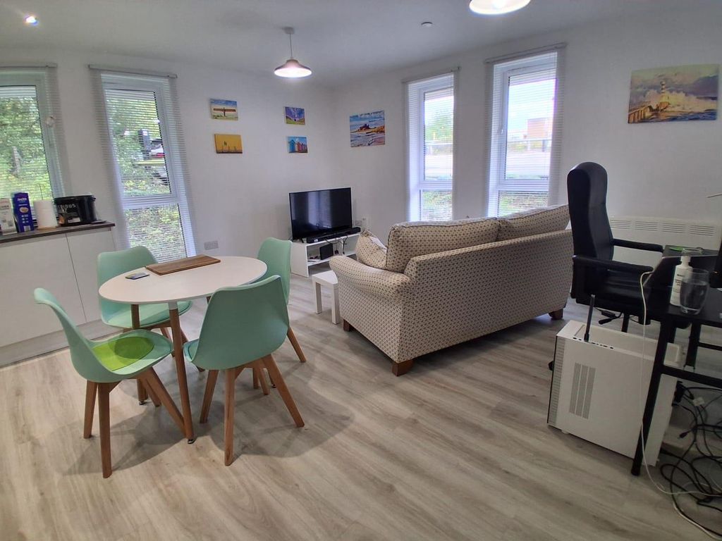 Property photo 1 of 6 Living Area