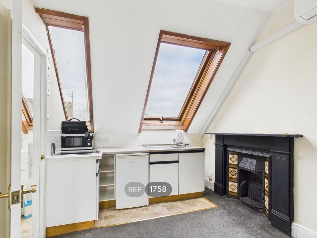 Property photo 2 of 7 Kitchen/Living Area