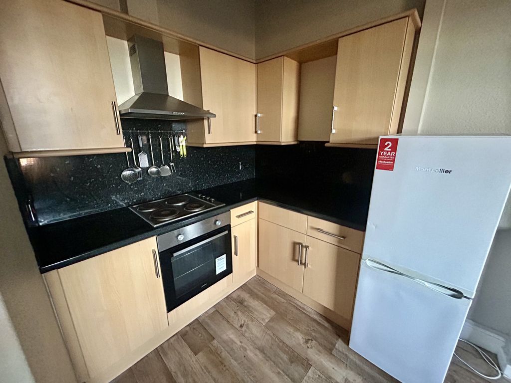 Property photo 3 of 9 Kitchen