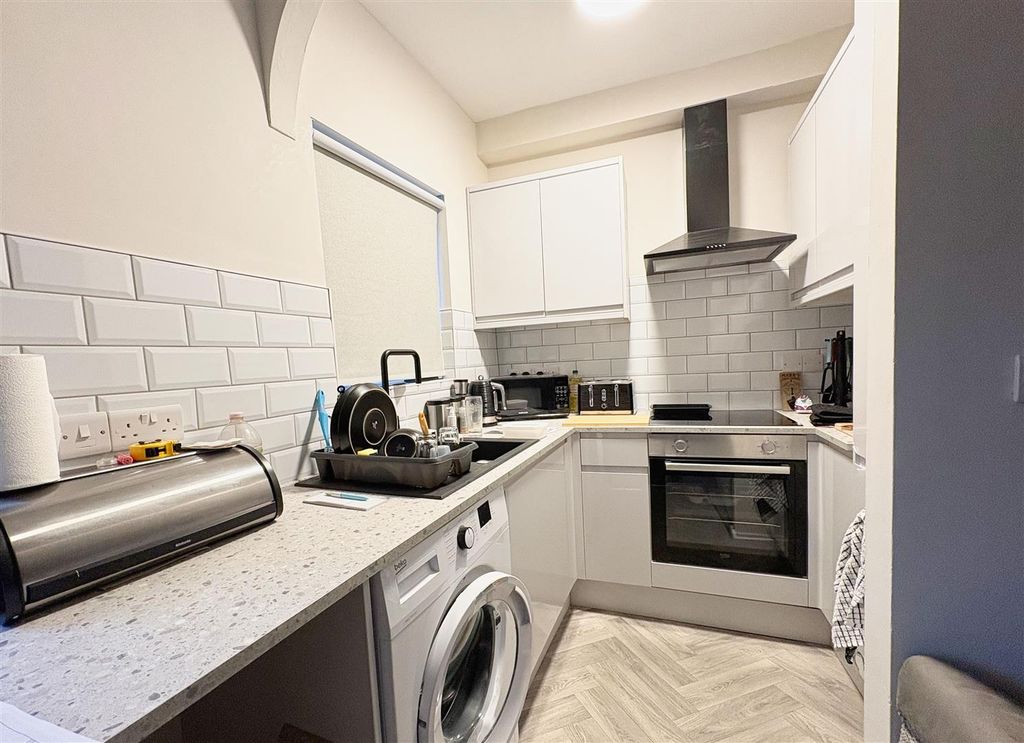 Property photo 3 of 6 Kitchen Area