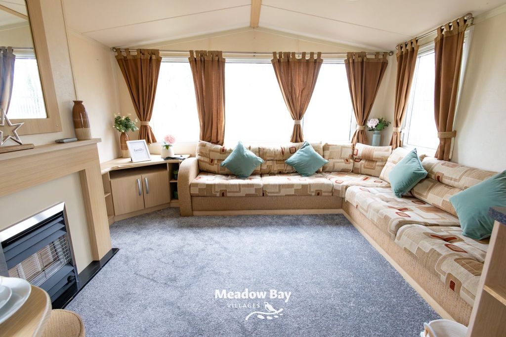 Property photo 2 of 15 2009 Burgundy 35x12 3B Billing 21.Jpg