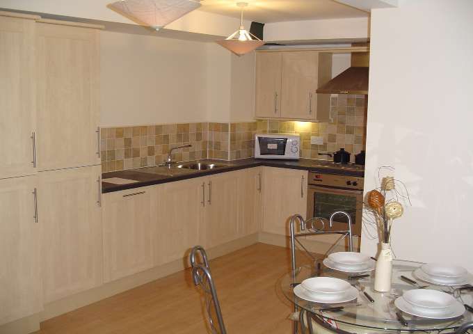 Property photo 1 of 4 Kitchen Area