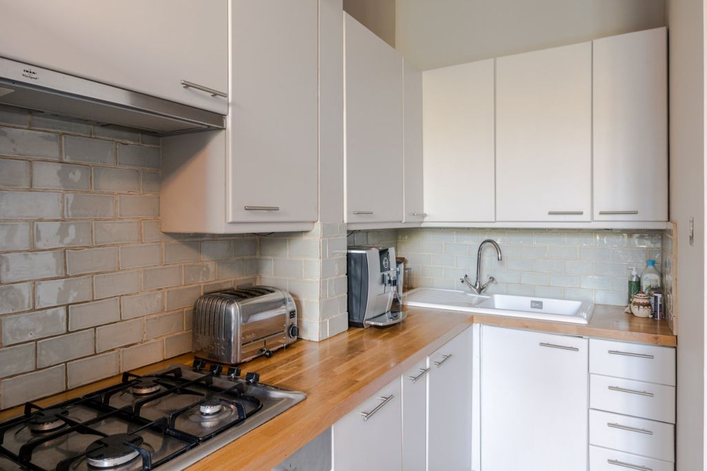 Property photo 3 of 8 Kitchen