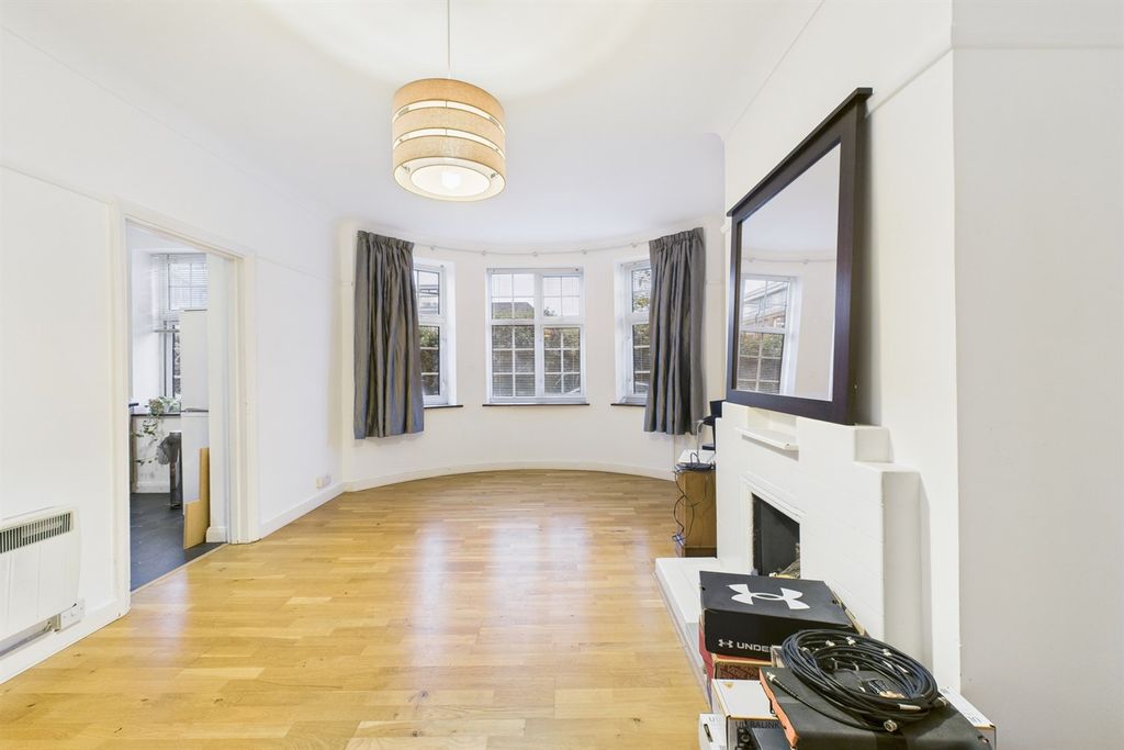 Property photo 2 of 11 Living Area