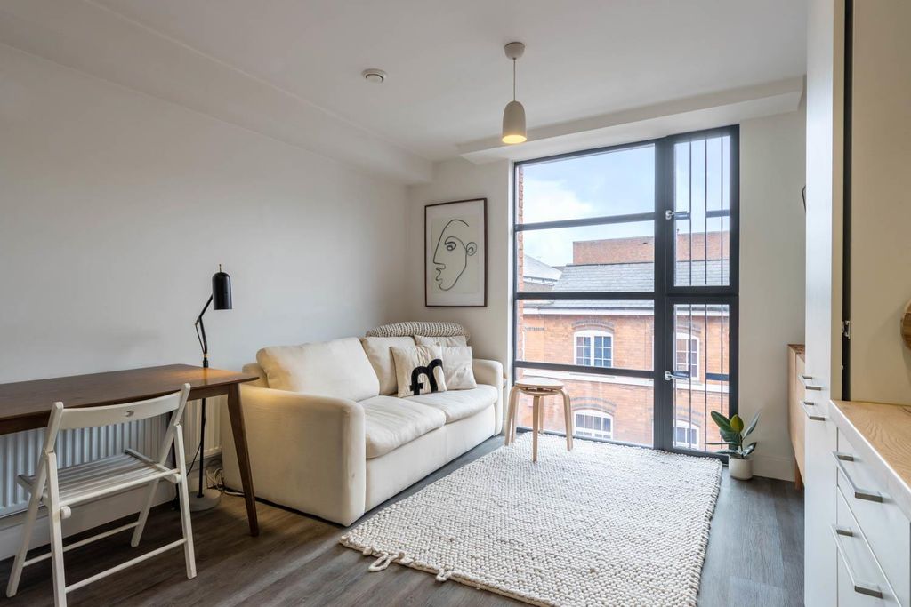 Property photo 1 of 10 Living Area