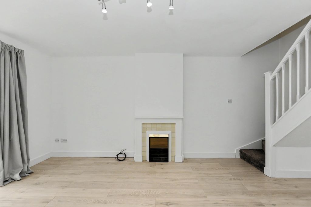 Property photo 3 of 12 Living Area - Angle 2