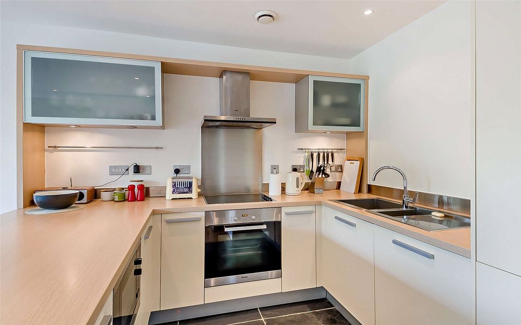 Property photo 3 of 13 Kitchen Area