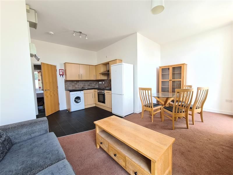 Property photo 3 of 5 Kitchen Living
