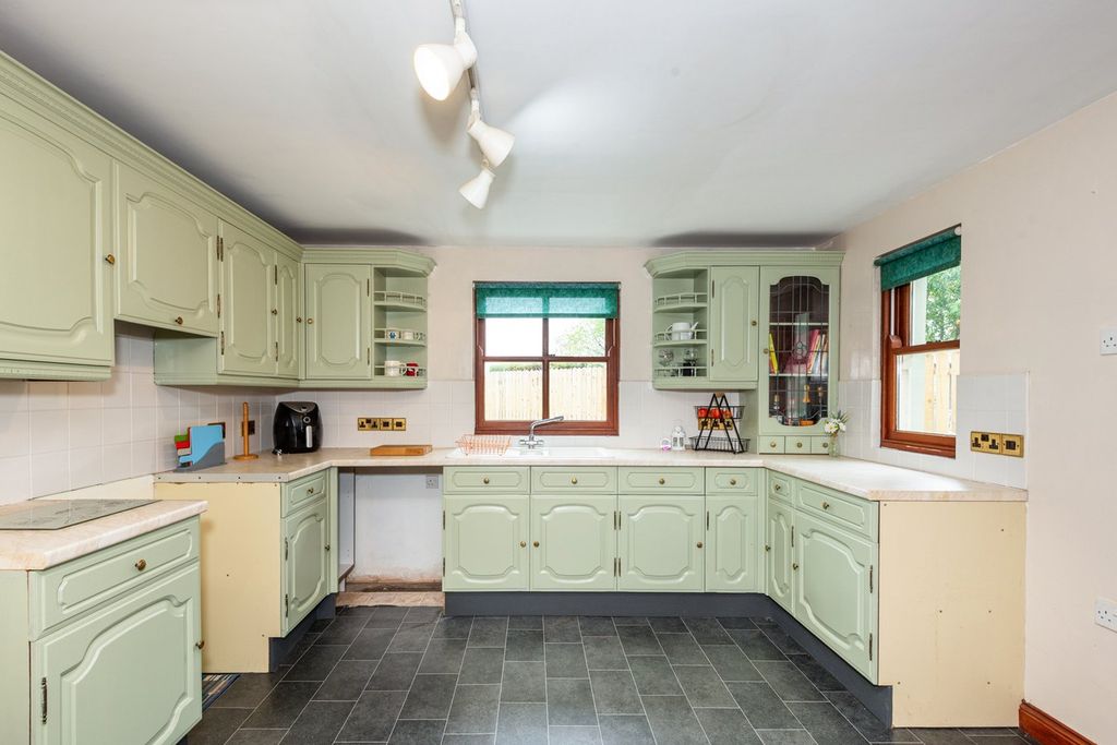 Property photo 3 of 24 Kitchen