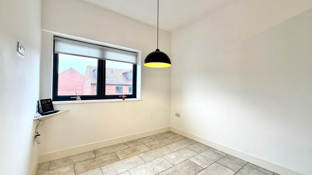 Property photo 3 of 11 Living Area