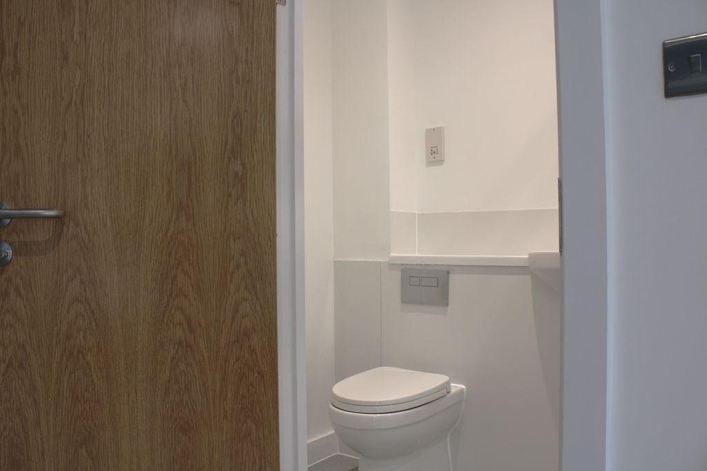 Property photo 1 of 5 A Pristine And Modern Single Toilet, Featuring A c...