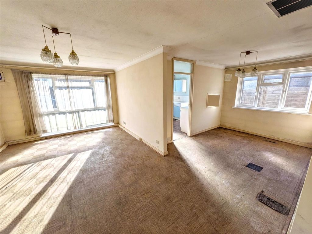 Property photo 3 of 12 Living Area