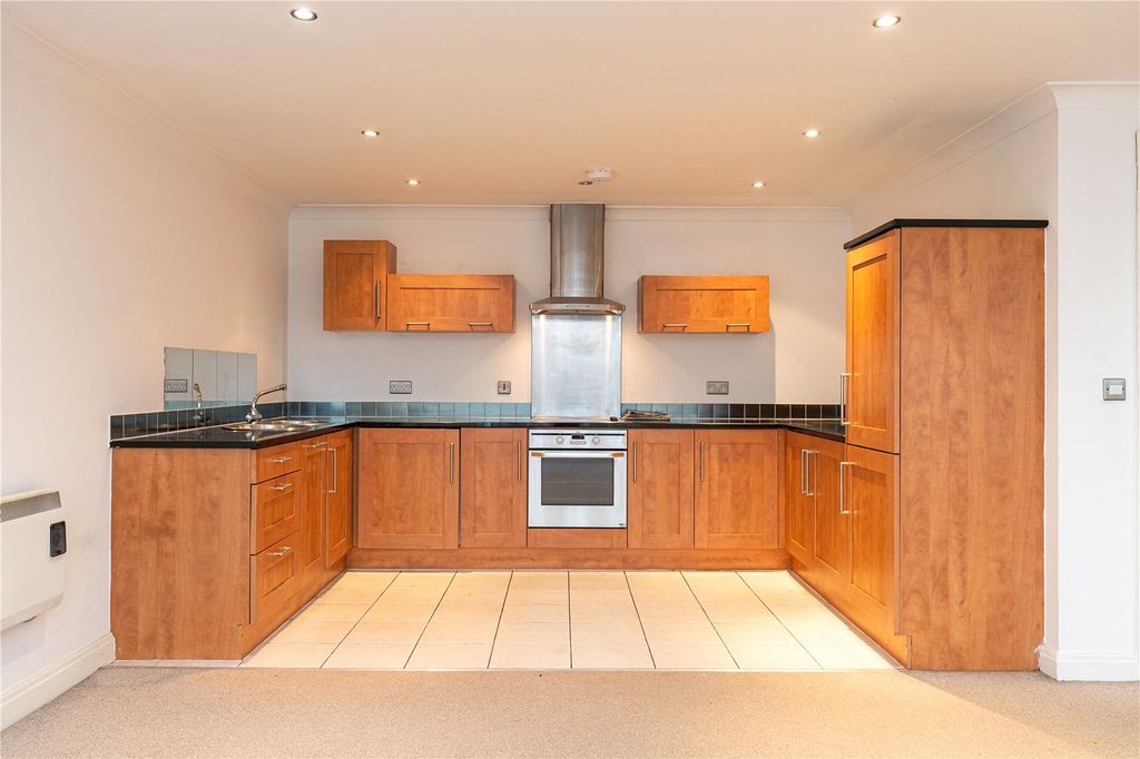 Property photo 2 of 12 Kitchen Area