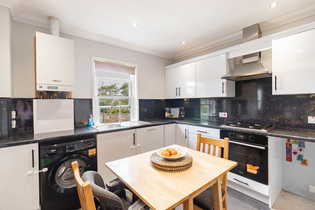 Property photo 2 of 30 Dining Kitchen
