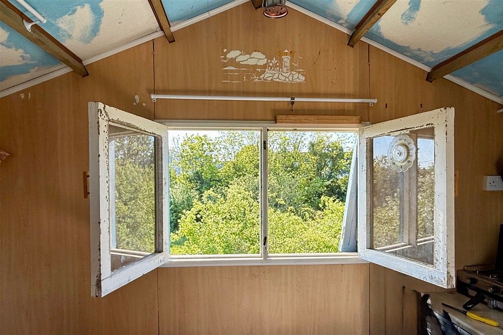 Property photo 3 of 7 Rear Windows