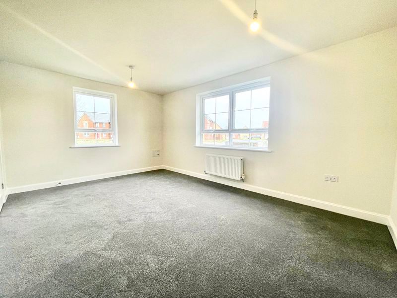 Property photo 3 of 13 Living Room Alt View