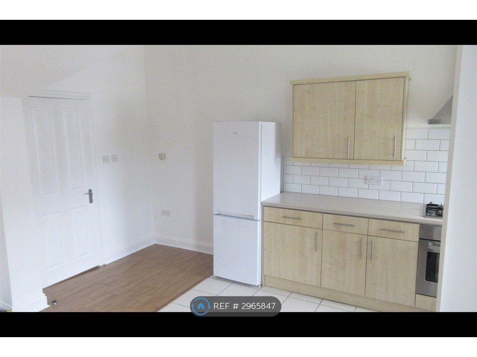 Property photo 3 of 12 Kitchen / Living Area