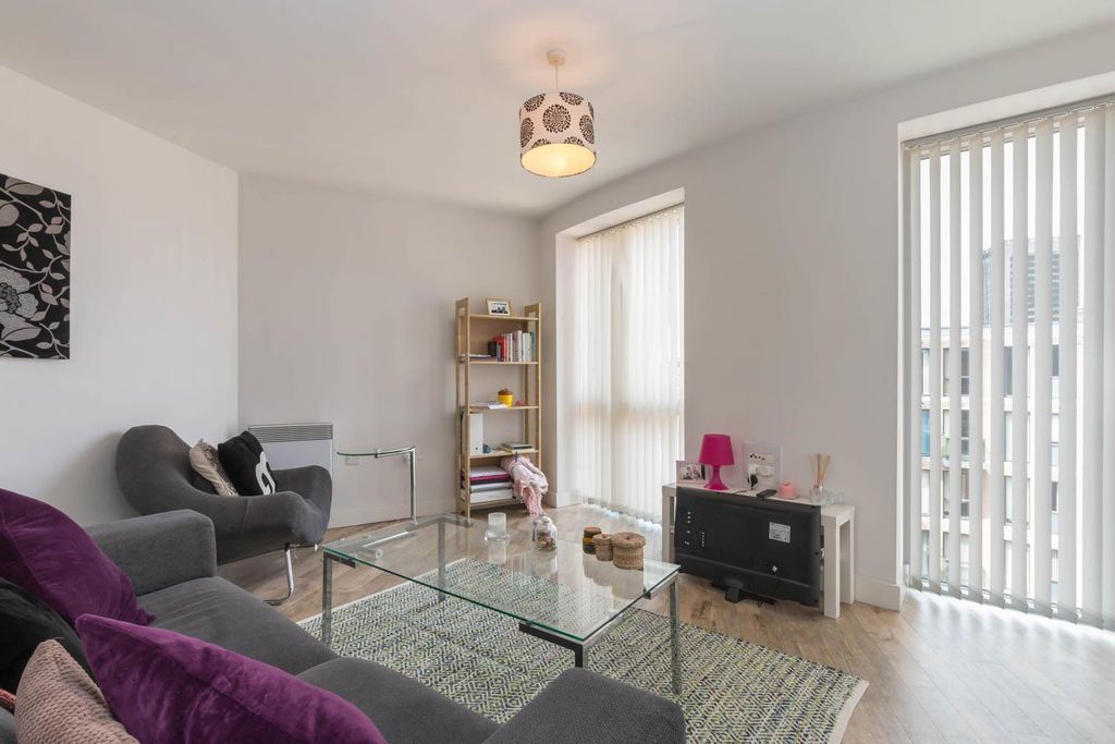 Property photo 2 of 9 Living Area