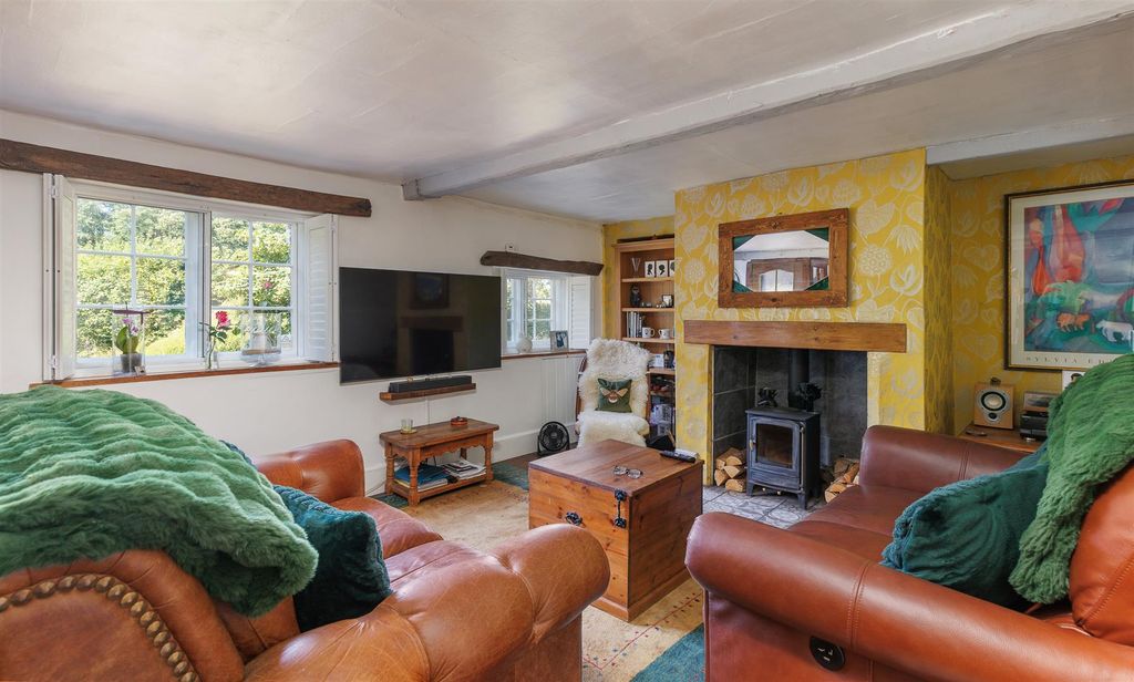 Property photo 3 of 31 Sitting Room With Log Burner