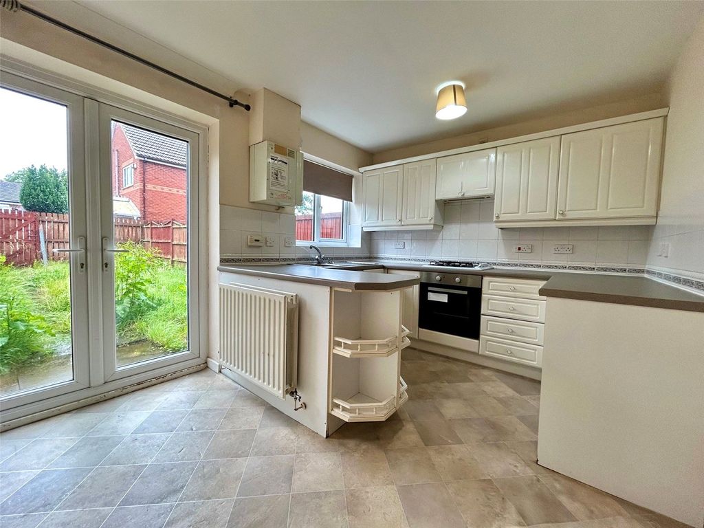 Property photo 3 of 15 Dining Kitchen
