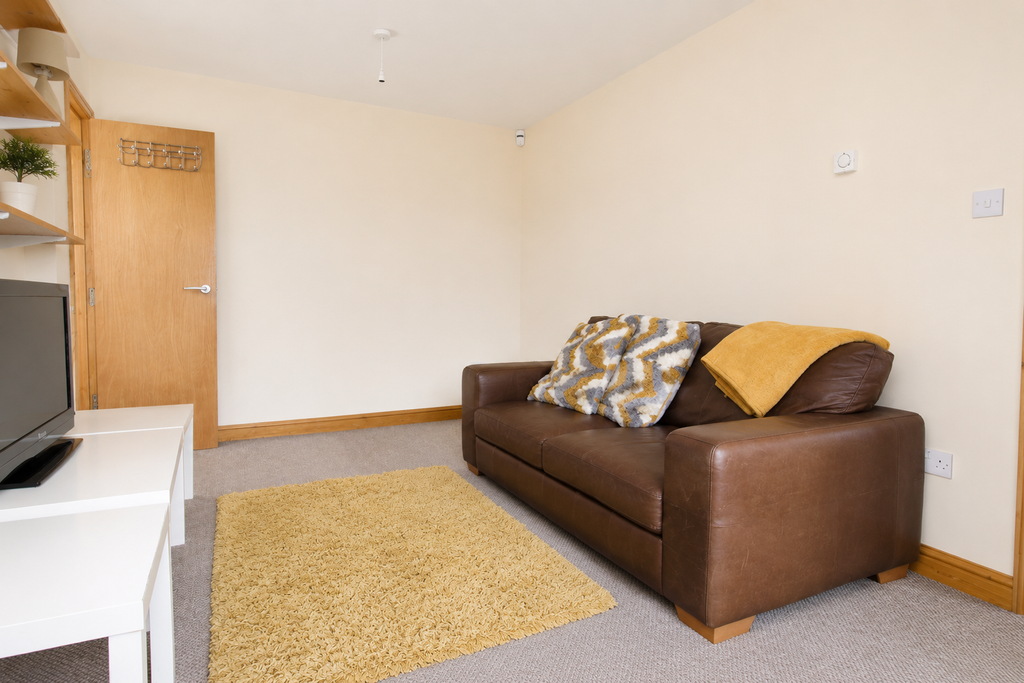 Property photo 3 of 7 Living Room - Angle 1