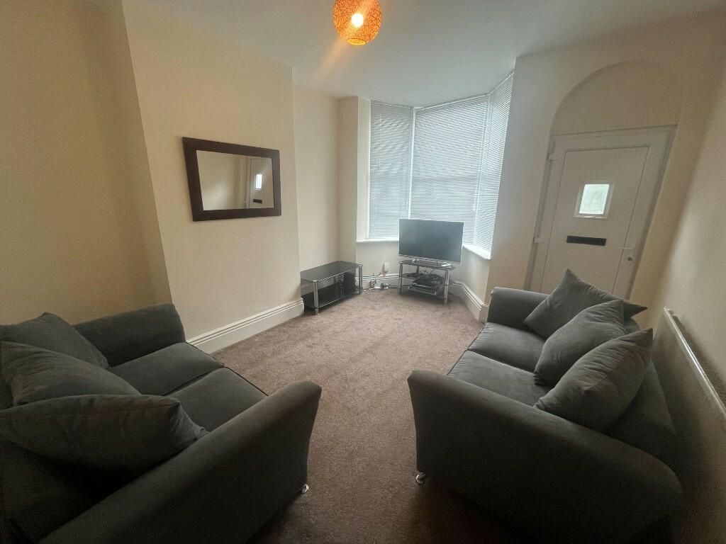 Property photo 3 of 10 A Comfortable Living Room Featuring Two Plush Sofa...