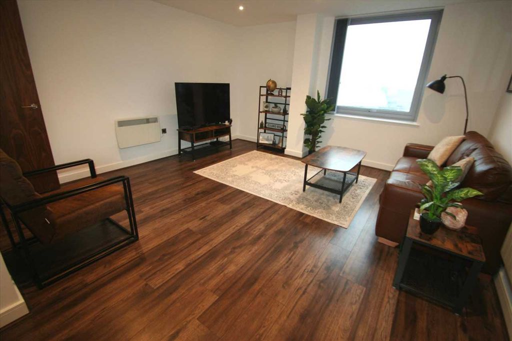 Property photo 2 of 7 Living Area