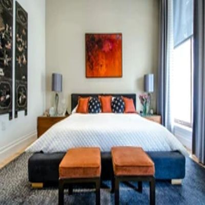 Property photo 1 of 1 Bright And Stylish Master Bedroom Featuring A Comf...