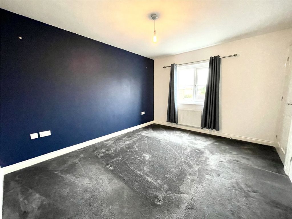 Property photo 3 of 8 Bedroom One