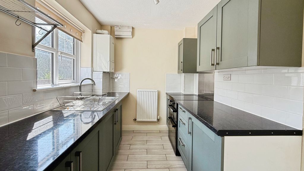 Property photo 3 of 12 Kitchen