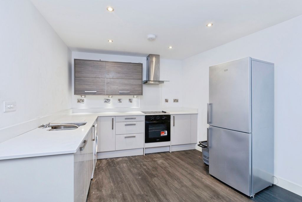 Property photo 3 of 12 Kitchen