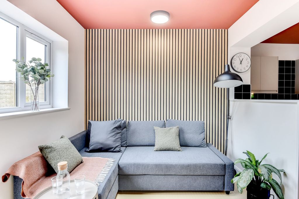 Property photo 3 of 6 This Stylish Living Room Features Contemporary Dec...