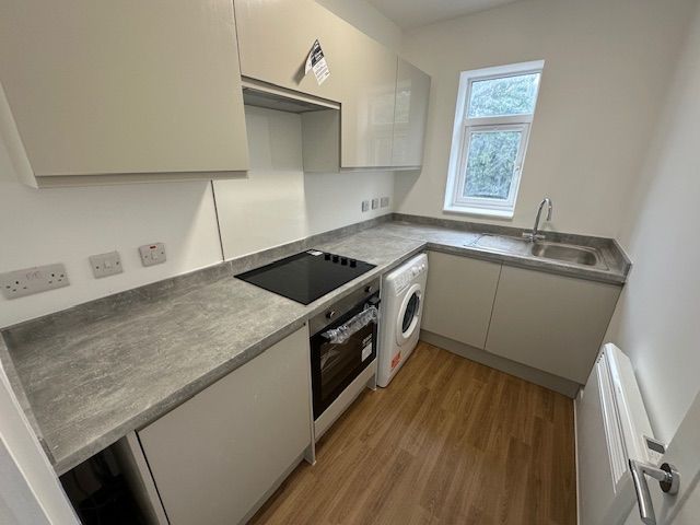 Property photo 1 of 8 Kitchen