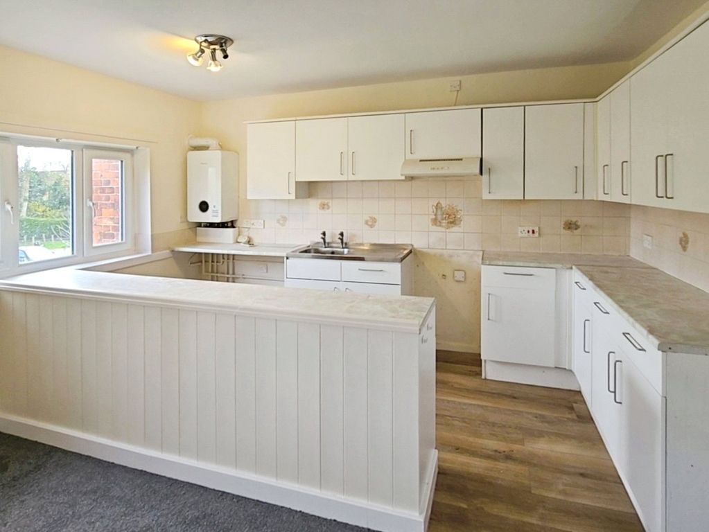 Property photo 3 of 9 Kitchen Area