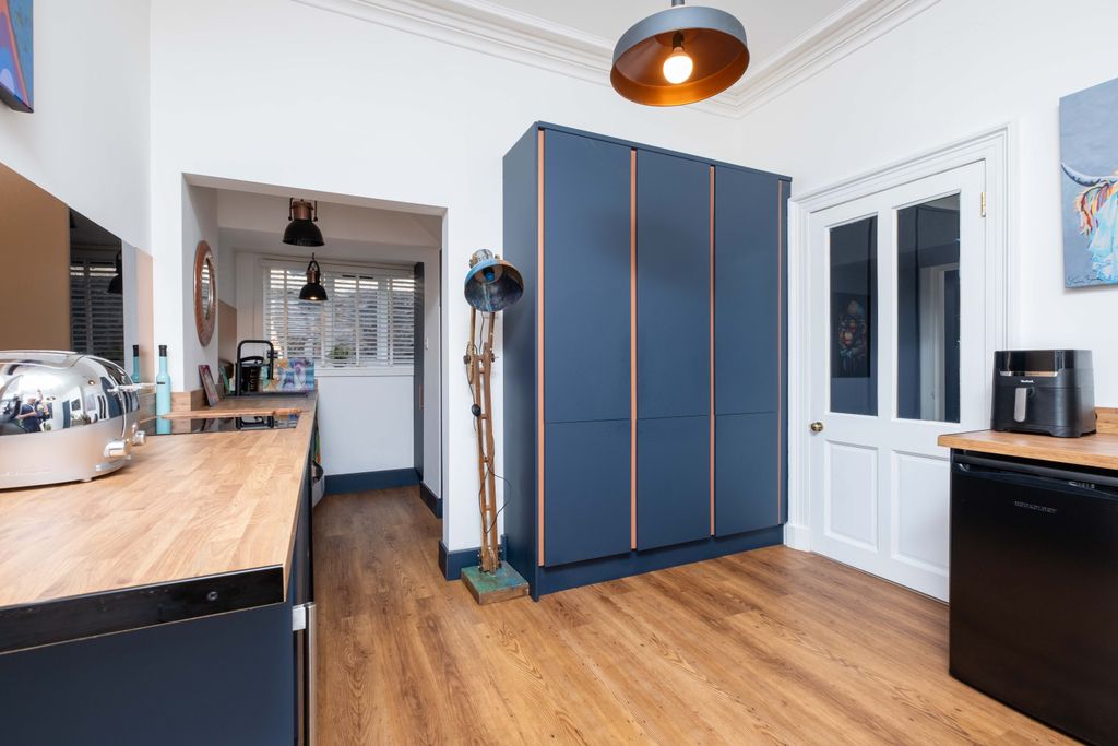 Property photo 3 of 21 Dining Kitchen