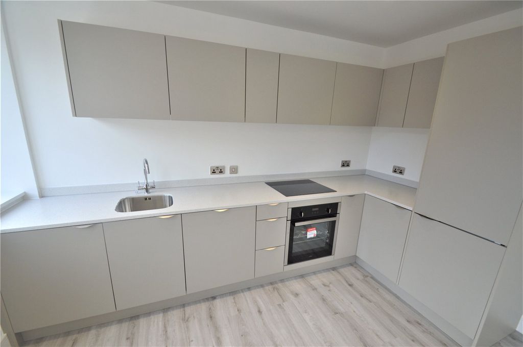 Property photo 3 of 8 Kitchen