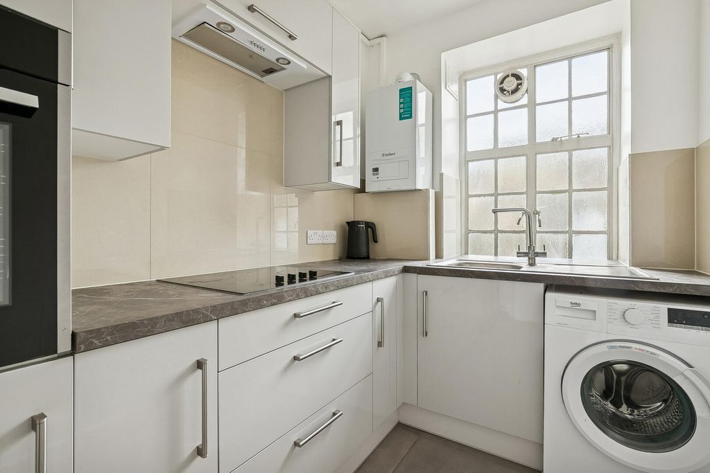 Property photo 3 of 12 Kitchen