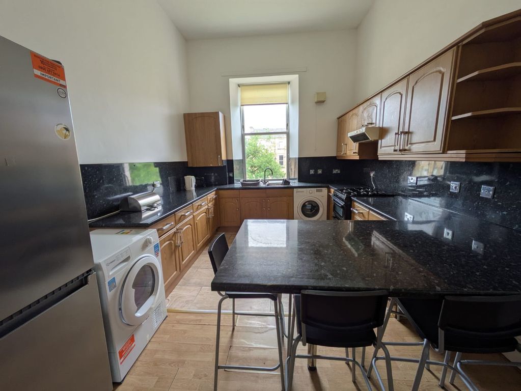 Property photo 3 of 12 Kitchen B