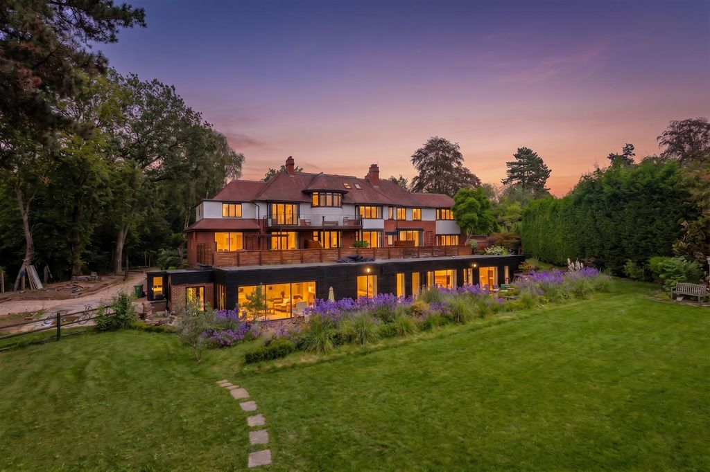 Property photo 2 of 33 Rear Elevation At Dusk