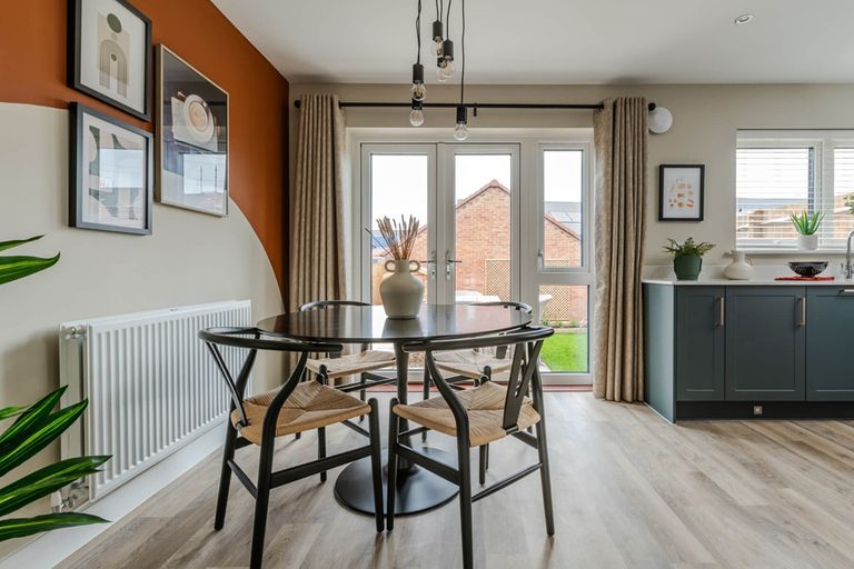 Property 3 of 10. The Double Doors In The Kitchen/Dining Area Create A Light And Airy Space