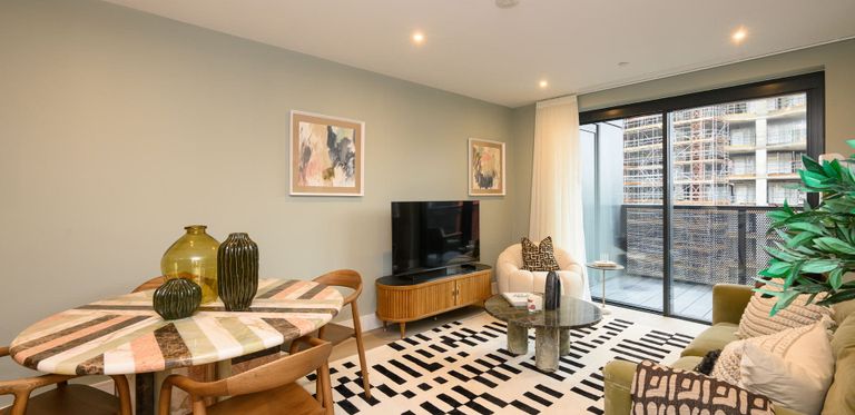 Property 1 of 1. Modern Designed And Decorated Living Room Dining Area.
