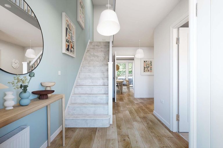Property 3 of 12. A Welcoming Hallway With Cloakroom And Storage Space